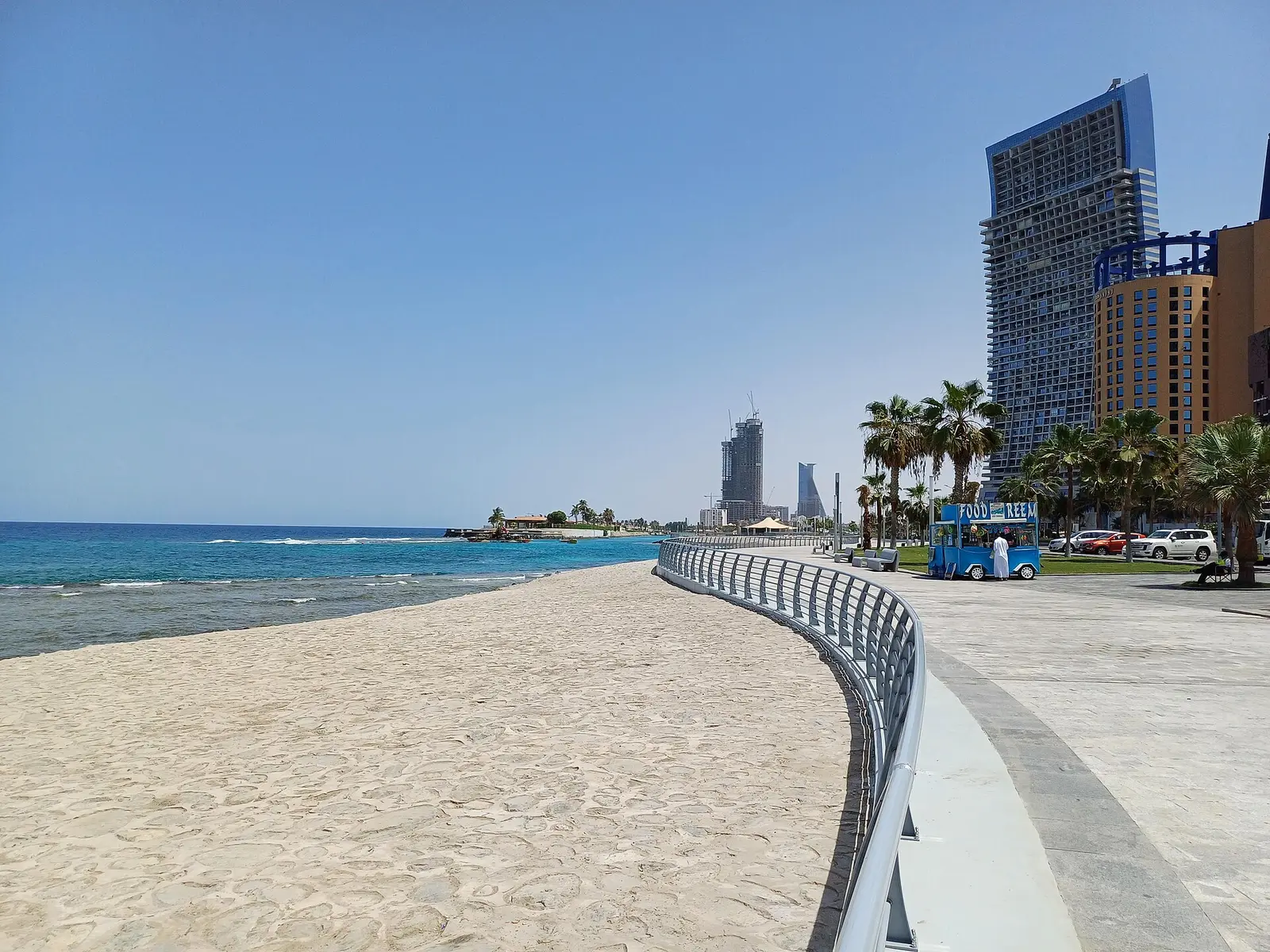 Jeddah Corniche beach and promenade with towers behind and the Red Sea